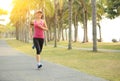 Runner athlete running at tropical park Royalty Free Stock Photo