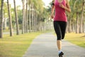 Runner athlete running at tropical park Royalty Free Stock Photo