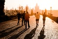 Runner athletes have morning jogging workout on Charles Bridge in Prague, Czech Republic. Healthy lifestyle and active