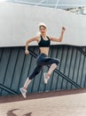 Runner. Beautiful fitness sport girl running with fit body in sportswear Royalty Free Stock Photo