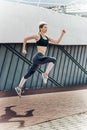Runner. Beautiful fitness sport girl running with fit body in sportswear Royalty Free Stock Photo