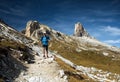 Trail Runner running on a rocky path in the mountains