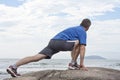 Runner doing stretching exercise