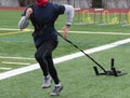 Runner dragging a sled with weight for resistance training Royalty Free Stock Photo