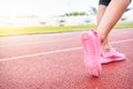 Runner feet running on road