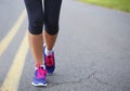 Runner Female Feet Running on Road Royalty Free Stock Photo