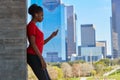 Runner girl hearing music earphones in the city