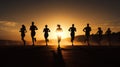 Runner group running on sunrise