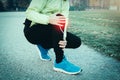 Runner with injured ankle while training Royalty Free Stock Photo