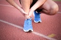 Runner with injured knee on the track Royalty Free Stock Photo