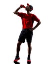 Runner jogger drinking energy drinks silhouette