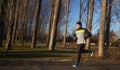 Runner joggin in the park in the winter Royalty Free Stock Photo