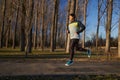 Runner joggin in the park in the winter