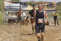 Runner just after passing under the barbed wires Royalty Free Stock Photo