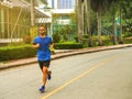 Runner man. Health and fitness outdoor concept. Man is runing in the morning and runing in a park Royalty Free Stock Photo