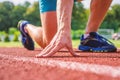 Runner ready to go close up. Ready steady go concept. At beginning of great sport career. Starting point. Hand touch Royalty Free Stock Photo