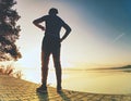 Runner during run using his wearable technology smartwatch