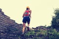 Runner running at great wall on the top of mountain Royalty Free Stock Photo