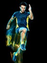 Runner running jogger jogging man isolated light painting black background Royalty Free Stock Photo