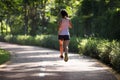 Runner running on morning park road workout jogging Royalty Free Stock Photo