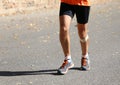 Runner runs with a patch below the knee