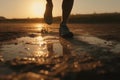 A runner runs on a wet road at sunset, legs in sneakers close-up. AI generative