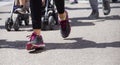 Runner s wooman shoes and feet during city marathon competition Royalty Free Stock Photo