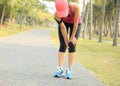 Runner sports injured knee Royalty Free Stock Photo