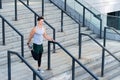 Runner in sportswear warming up. Training on fresh air. Athletic young man stretching his legs muscles. sporty man Royalty Free Stock Photo