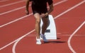 Runner in start position prepares for the start. Individual sport conept