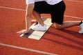 Runner starting position. athelte is preparing for the sprint. Royalty Free Stock Photo