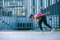 Runner in the street bending head down stock photo Royalty Free Stock Photo