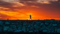 Runner at sunrise with the sun creating the silhouette Royalty Free Stock Photo