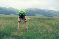 Runner taking a rest after running forest trail