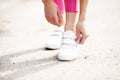 Runner trying running shoes getting ready for run. Healthy lifestyle Royalty Free Stock Photo