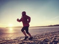 Runner woman feet running on offshore. Female fitness Royalty Free Stock Photo