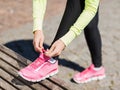 Runner woman lacing trainers shoes Royalty Free Stock Photo