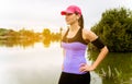 Runner woman stretching a pier Royalty Free Stock Photo