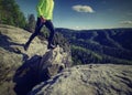 Runner in yellow green shinning  jacket and black leggings Royalty Free Stock Photo