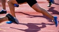 Runners in action on the running track Royalty Free Stock Photo