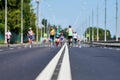 Runners on city road