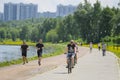 Runners and cyclists on the tracks of Kolomenskoye park in Moscow Royalty Free Stock Photo