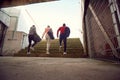 .Runners going to training on stadium.Going to win their goals Royalty Free Stock Photo