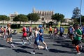 Runners during palma half marathon passing next to palma cathedral