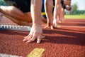 Runners preparing for race at starting blocks Royalty Free Stock Photo