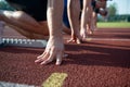 Runners preparing for race at starting blocks Royalty Free Stock Photo