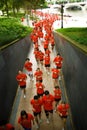 Runners racing in red tops