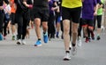 runners run at footrace in the city Royalty Free Stock Photo