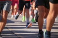 Runners running start line feet of man athletes shoes for background