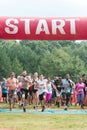 Runners Sprint Off Start Line In Extreme Obstacle Course Race